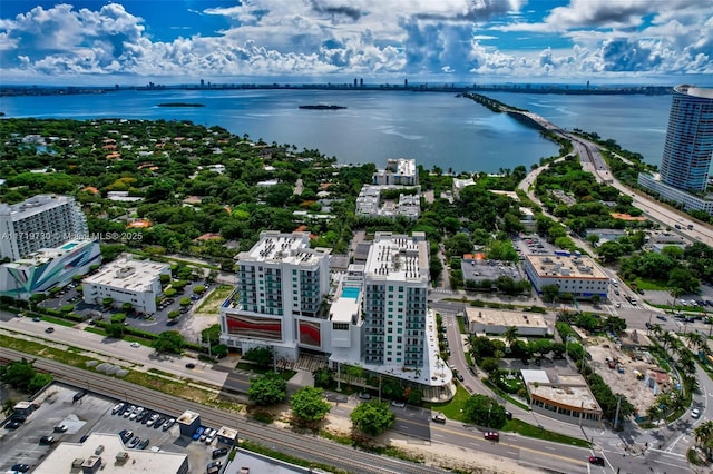 birds eye view of property featuring a water view