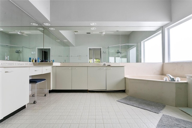 bathroom with separate shower and tub, tile patterned floors, and vanity