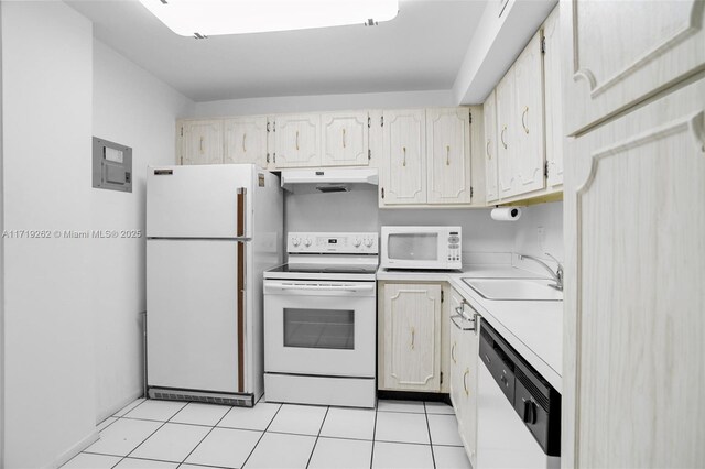 6700 Cypress Rd Unit 412, Plantation, FL 33317 - kitchen featuring white appliances, under cabinet range hood, a sink, light countertops, and electric panel