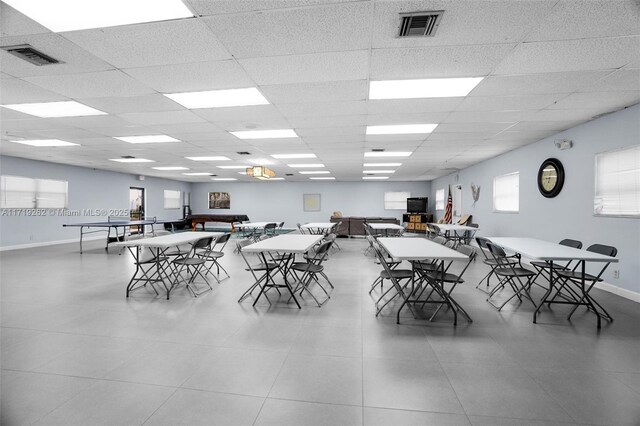 6700 Cypress Rd Unit 412, Plantation, FL 33317 - tiled dining area with a paneled ceiling and baseboards