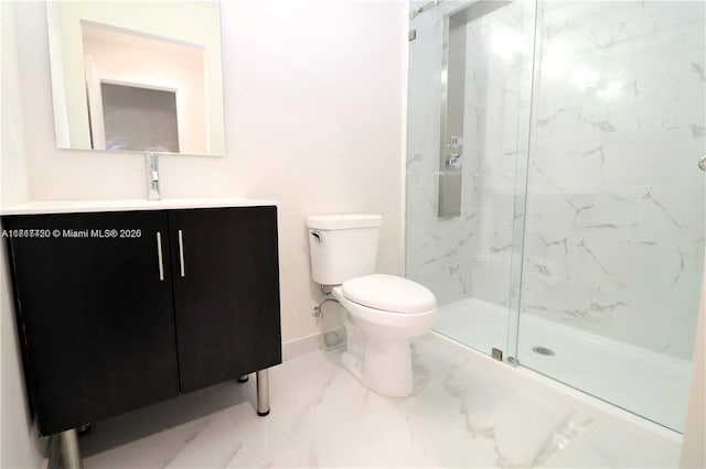 bathroom with vanity, toilet, and walk in shower