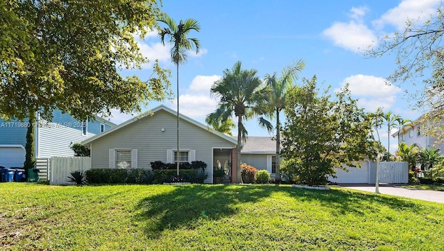 ranch-style house with a front yard