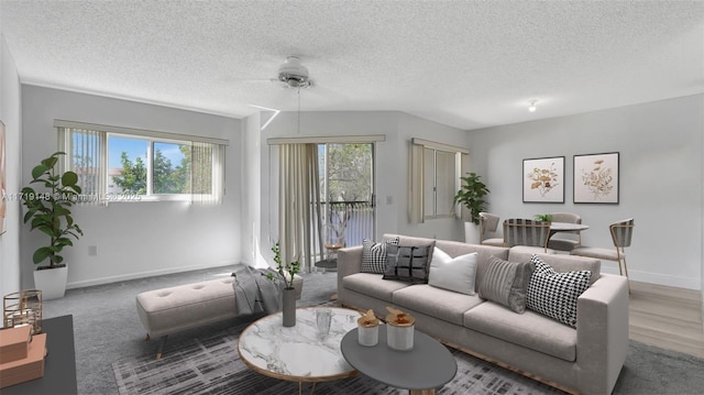 living room with a healthy amount of sunlight and a textured ceiling