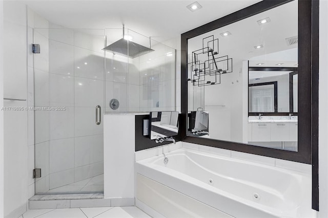 bathroom featuring tile patterned flooring, vanity, and independent shower and bath