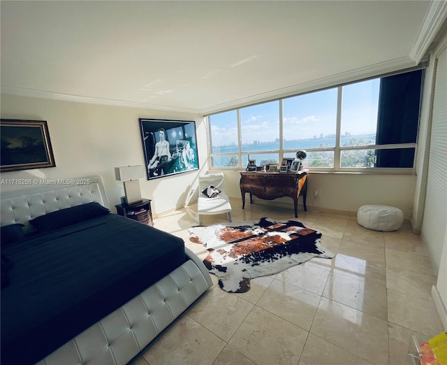 bedroom featuring light tile patterned floors, a water view, and ornamental molding