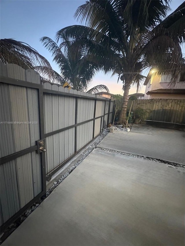 view of patio terrace at dusk