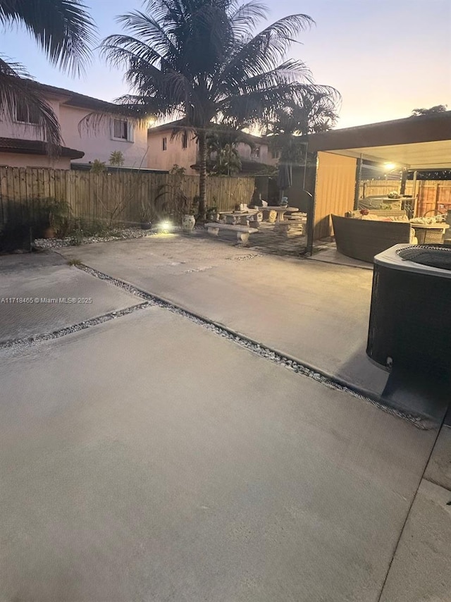 view of patio terrace at dusk