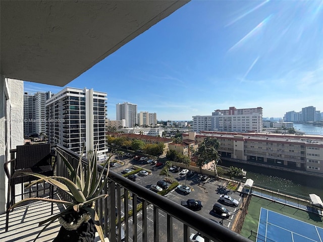 balcony featuring a water view