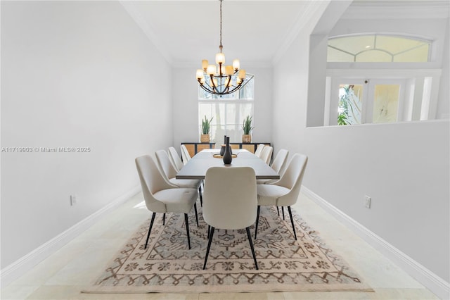 dining space with crown molding, plenty of natural light, and a chandelier