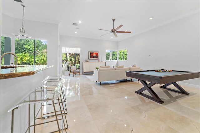 game room featuring ceiling fan, plenty of natural light, pool table, and crown molding