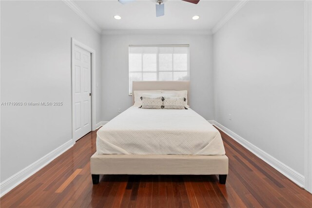 bedroom with ceiling fan, ensuite bathroom, crown molding, and dark hardwood / wood-style floors