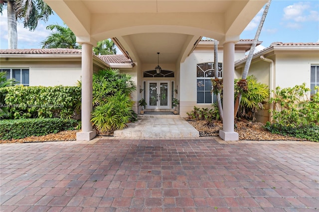 entrance to property featuring french doors