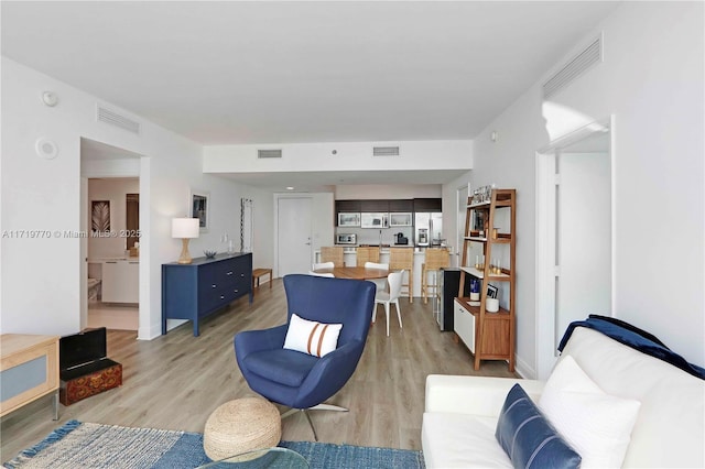 living room featuring light hardwood / wood-style floors