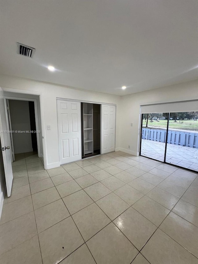 view of tiled empty room