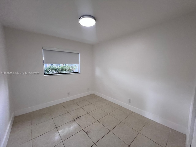 view of tiled spare room