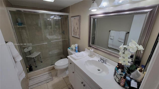 bathroom with tile patterned flooring, vanity, toilet, and a shower with door