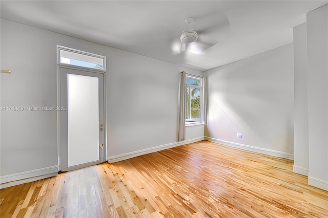 entrance foyer with ceiling fan and light hardwood / wood-style floors