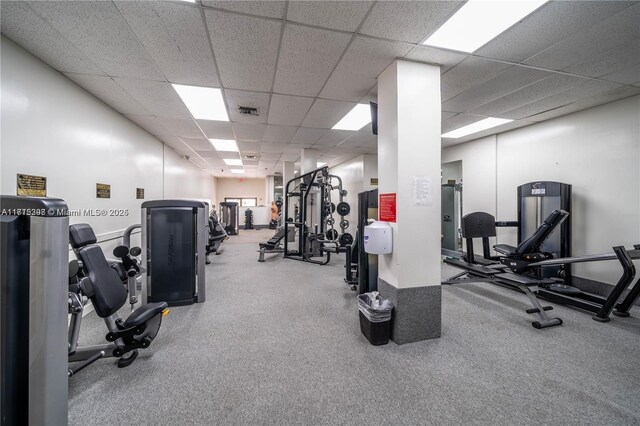 gym with a drop ceiling