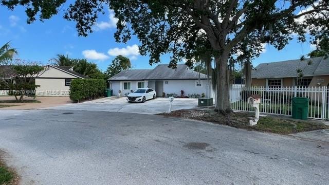 view of front of home with fence