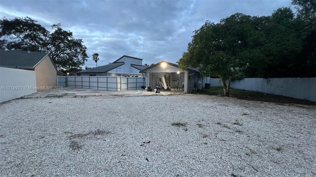 view of yard featuring a garage