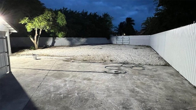 view of yard featuring a fenced backyard and a patio