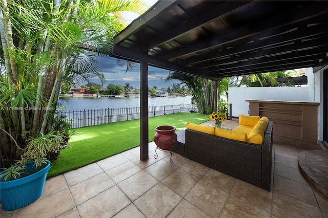 view of patio featuring an outdoor hangout area and a water view