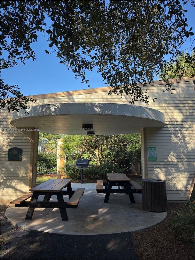 view of community with a patio