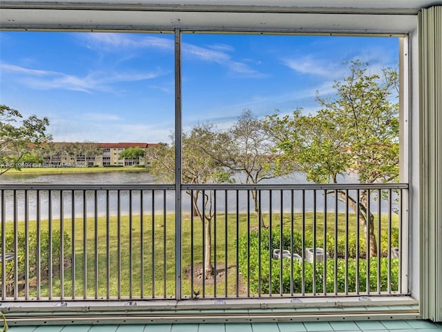 balcony featuring a water view