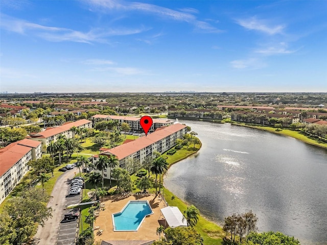 drone / aerial view with a water view