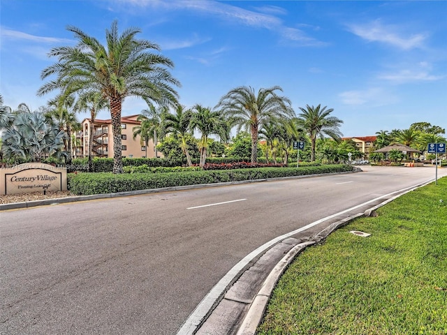 view of road featuring curbs