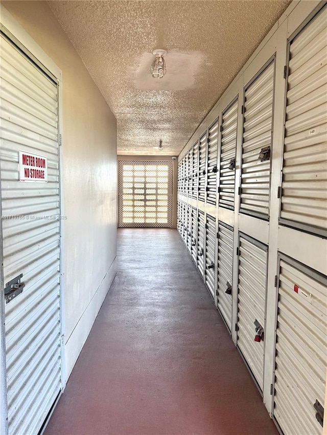 exterior space with a textured ceiling