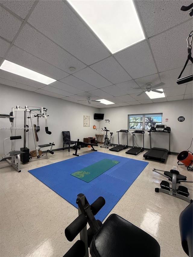 gym featuring a paneled ceiling