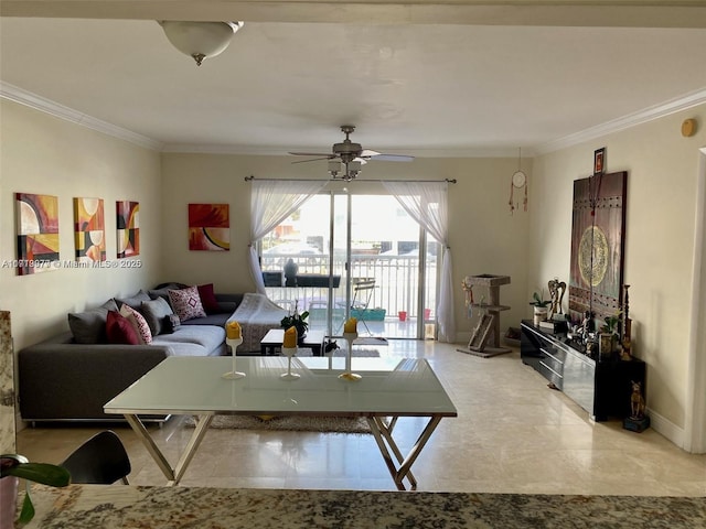 living room featuring ceiling fan and ornamental molding