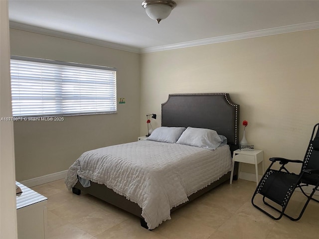 bedroom featuring light tile patterned floors and crown molding