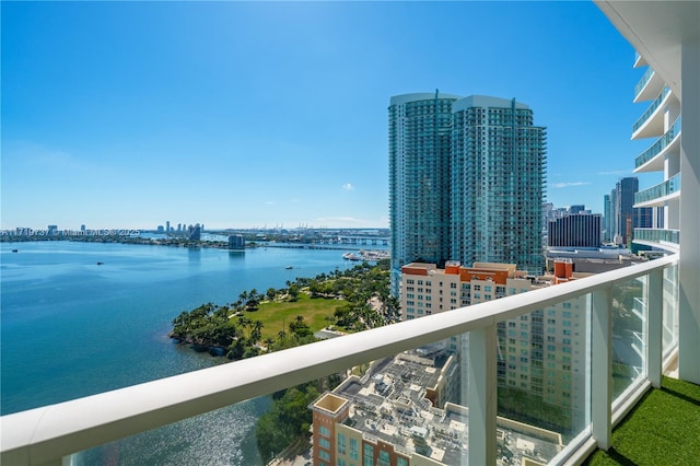 balcony featuring a water view