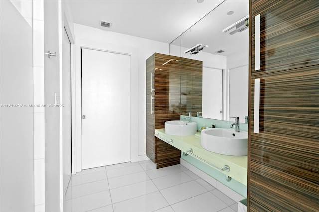 bathroom with vanity and tile patterned floors