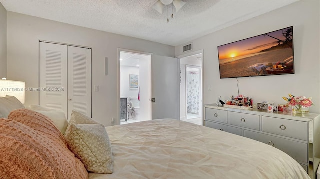 bedroom with ceiling fan, a closet, and a textured ceiling