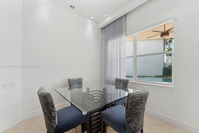 dining space featuring ceiling fan