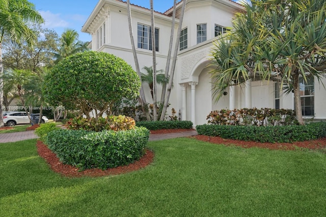 exterior space with a front yard