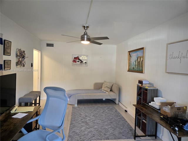 home office with ceiling fan and wood-type flooring