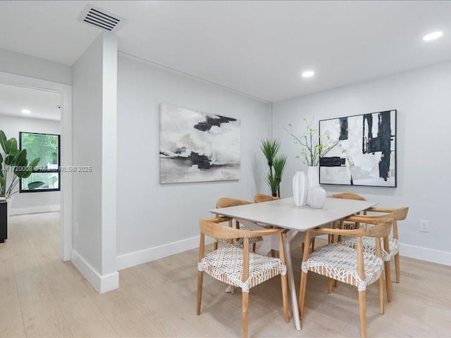 dining area featuring light hardwood / wood-style flooring