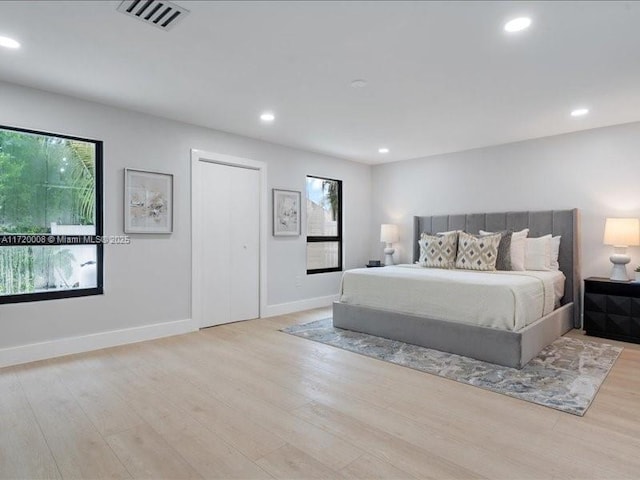 bedroom featuring light hardwood / wood-style floors