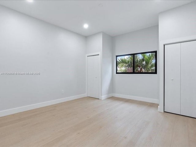 unfurnished bedroom featuring light hardwood / wood-style flooring