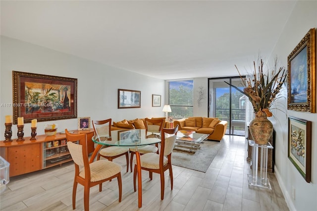 dining space with floor to ceiling windows