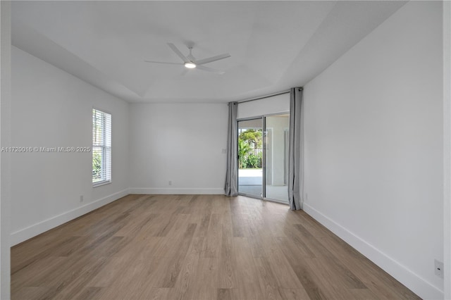 spare room featuring ceiling fan and light wood-type flooring