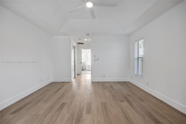 unfurnished room featuring ceiling fan and light hardwood / wood-style floors