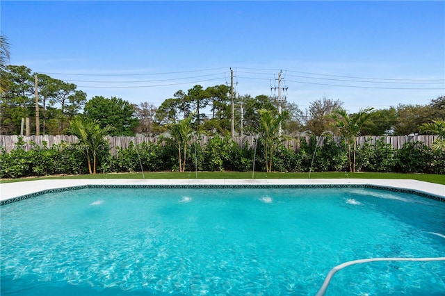 view of swimming pool featuring pool water feature