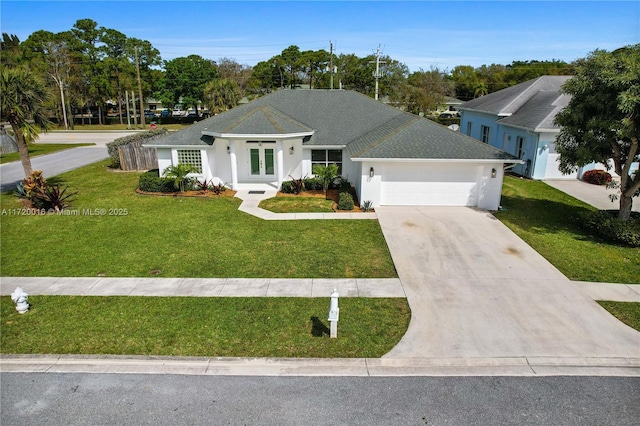 single story home with french doors, a garage, and a front lawn