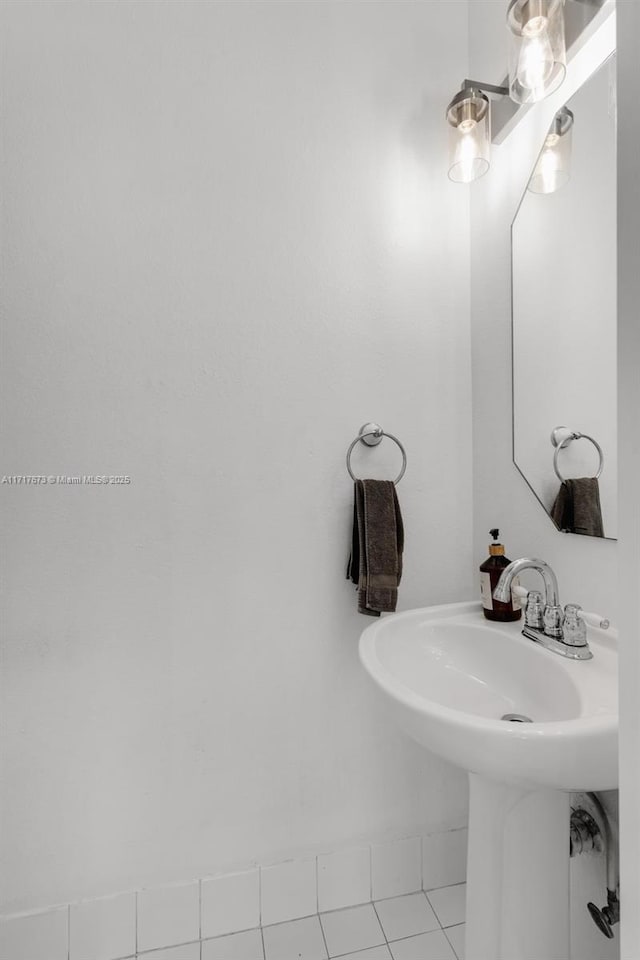 bathroom with tile patterned flooring