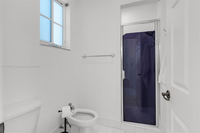 bathroom featuring walk in shower, tile patterned flooring, a bidet, and toilet